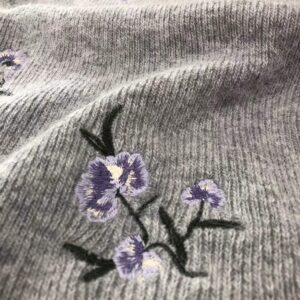 Machine-embroidered Knitwear